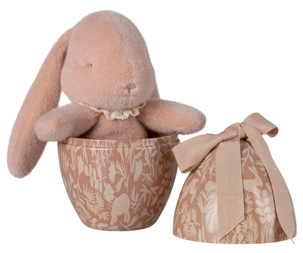 Huevo de pascua con conejo rosa